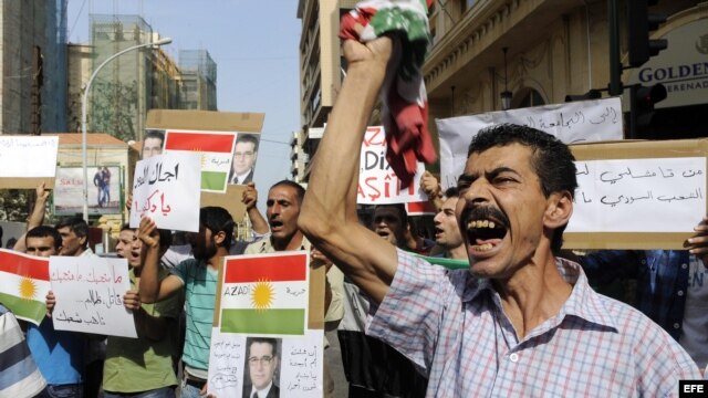 Fotografía de archivo de manifestantes sirios opositores del presidente Bachar al Asad.