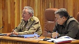 Raúl Castro y Marino Murillo.