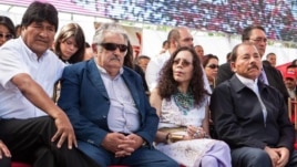 Los mandatarios Evo Morales (Bolivia), José Mujica (Uruguay) y Daniel Ortega (Nicaragua) en un acto en Caracas de apoyo al chavismo.