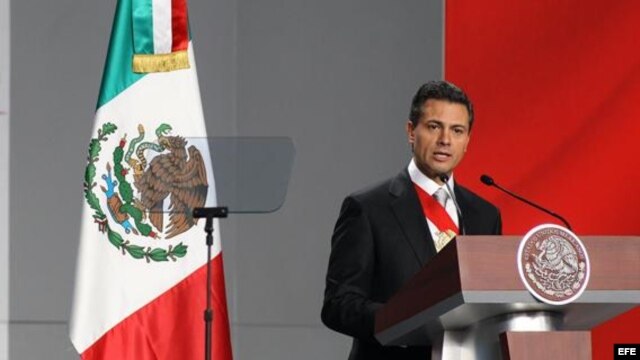 El mandatario de México, Enrique Peña Nieto, durante su mensaje en el Palacio Presidencial tras su investidura ante el pleno de la Cámara de Representantes el sábado 1 de diciembre de 2012, en la capital mexicana.