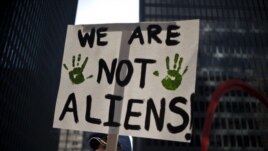  Organizaciones, iglesias, y grupos proinmigrantes marcan por el centro de Chicago, Illinois (EEUU). 