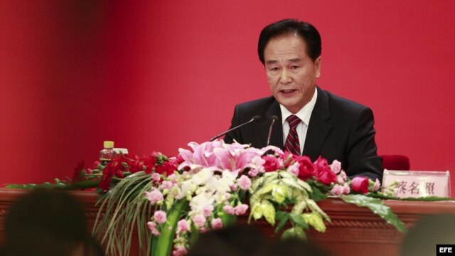 El portavoz oficial del XVIII Congreso del Partido Comunista de China (PCCh), Cai Mingzhao, responde pregunta de la prensa. 