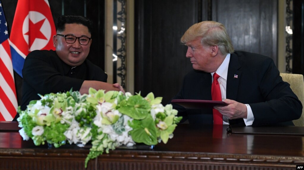 Kim Jong Un y Donald Trump.